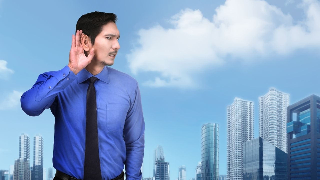 man hand on ear